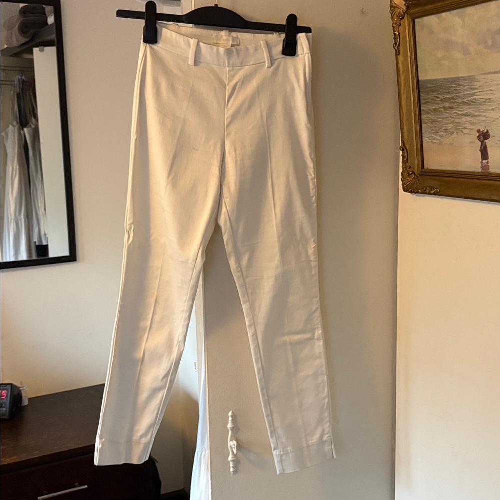 White Slim Fit Trousers. Long skinny, two fake pockets
